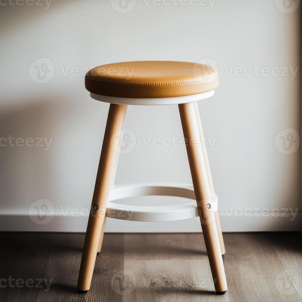 A stool with a white seat and wooden legs photo