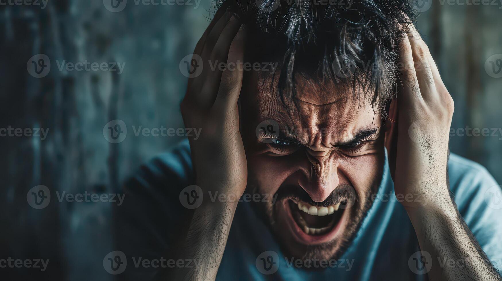 A man with his hands on his head and an angry expression photo