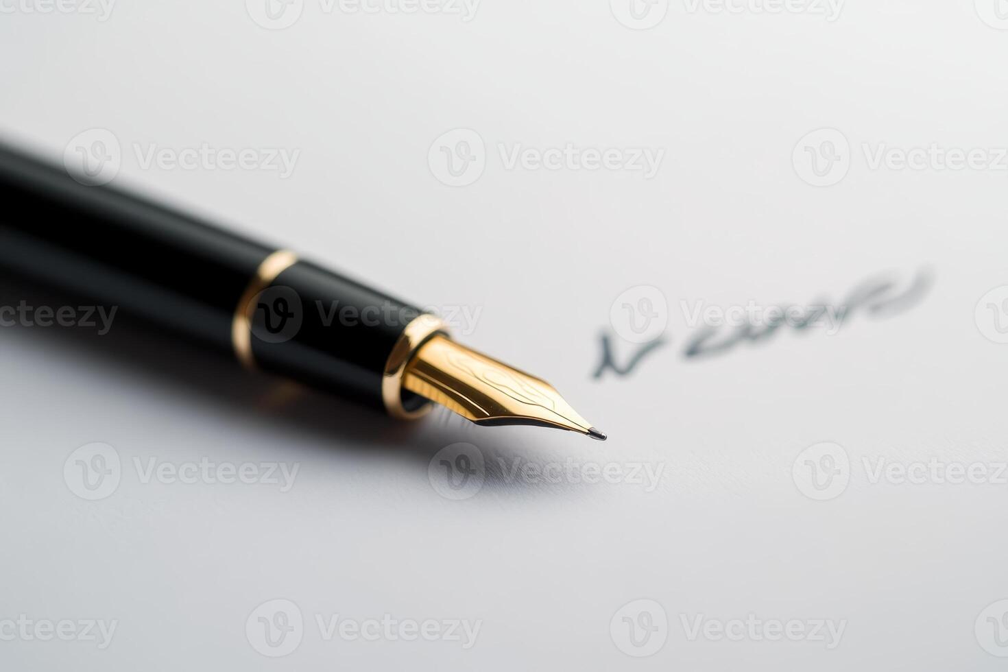 Elegant fountain pen poised to write a name on crisp white paper in a well-lit setting photo