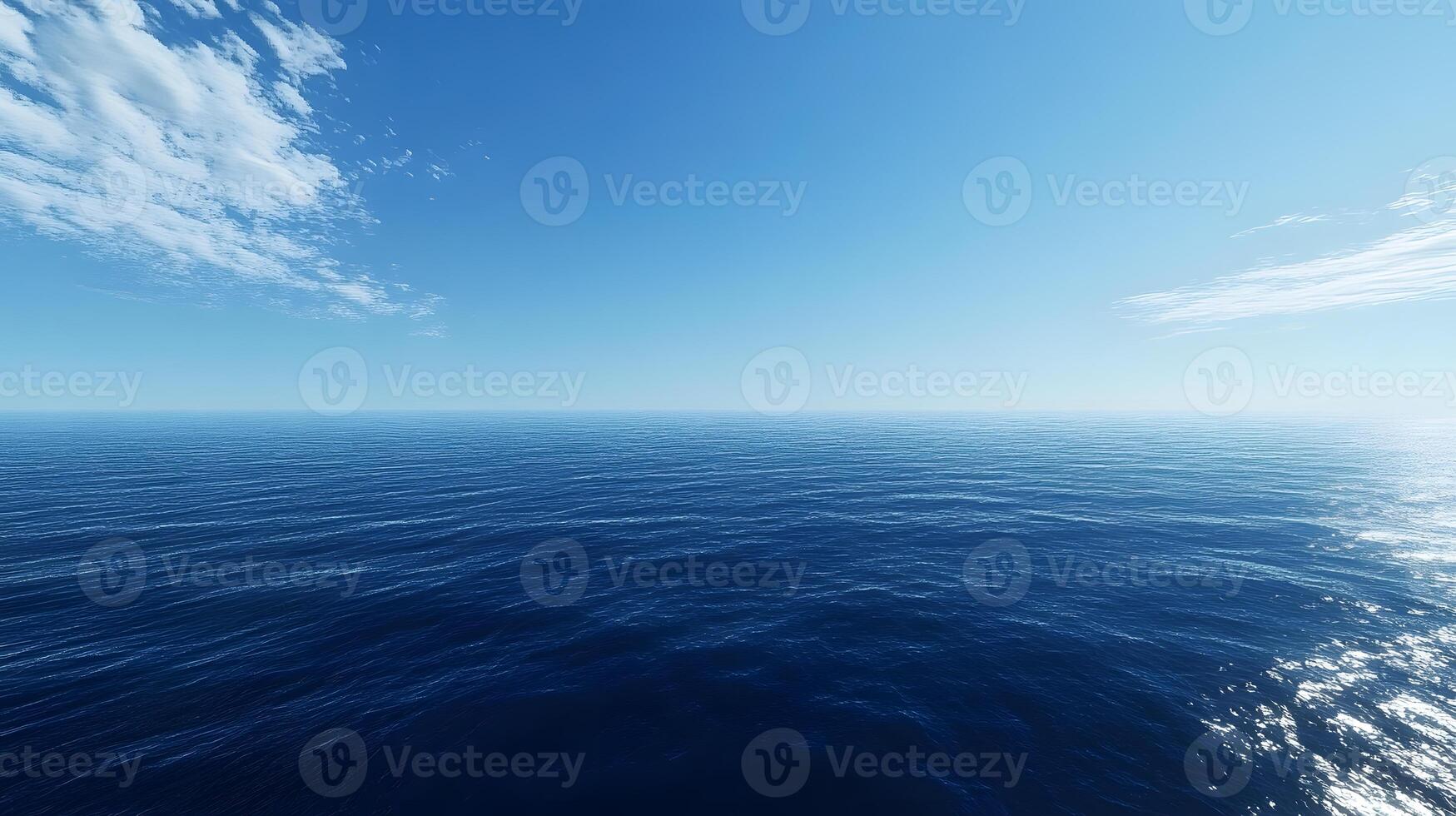 Blue ocean with soft ripples flowing beneath a pristine, cloudless sky photo