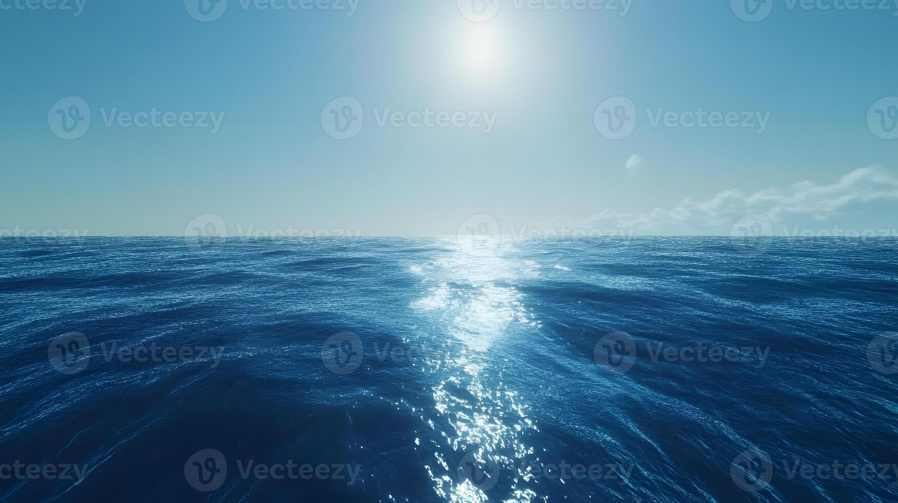 Serene blue ocean with smooth ripples reflecting a clear, cloudless sky photo