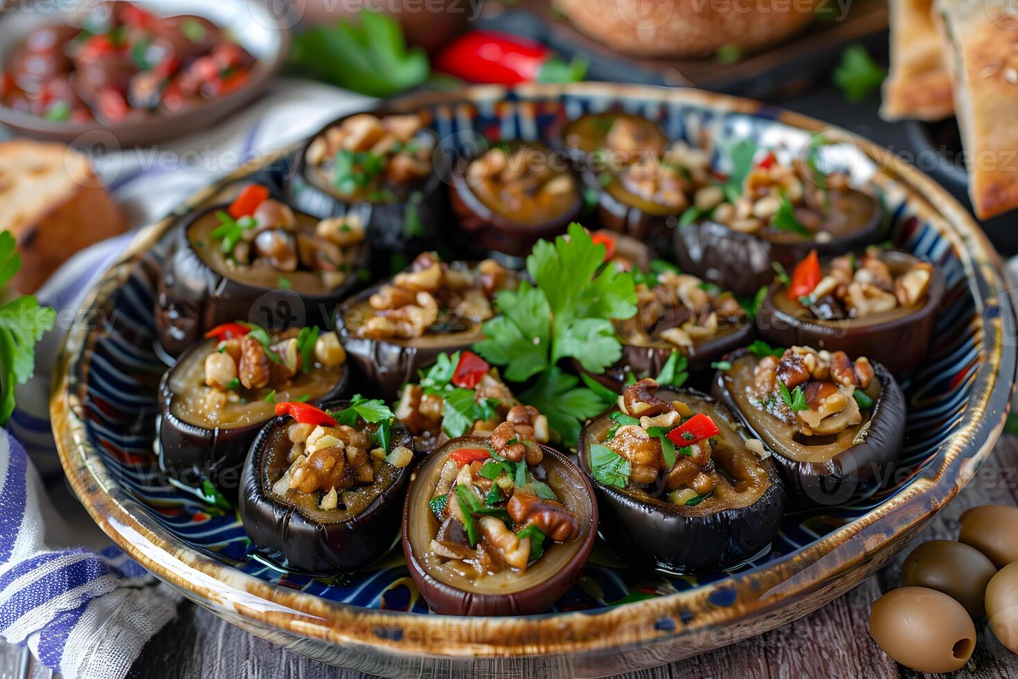 Makdous plate with small preserved eggplants stuffed with walnuts, garlic, and red pepper, beautifully arranged photo