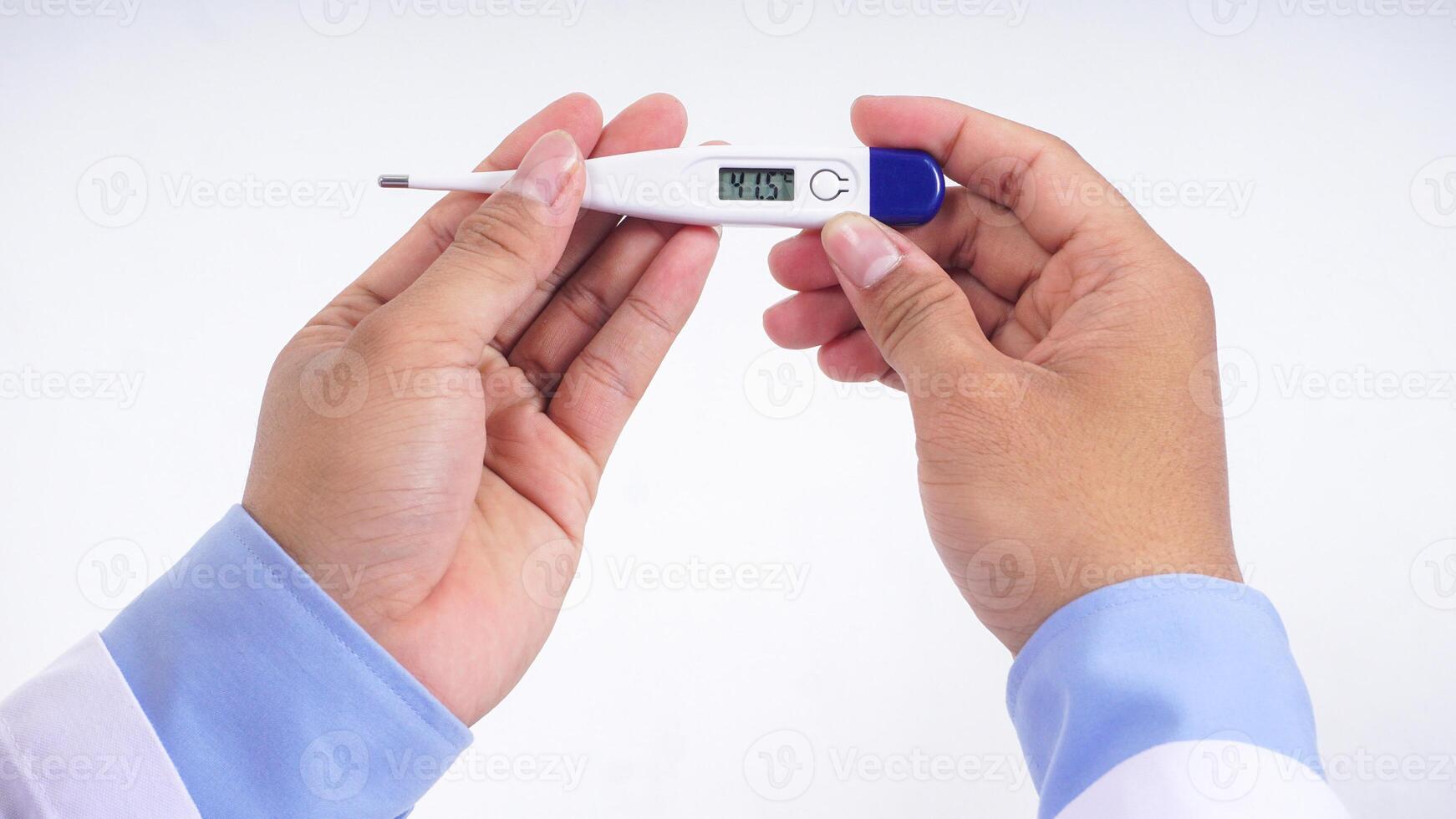Hand of Male Holding Thermometer on White Background photo