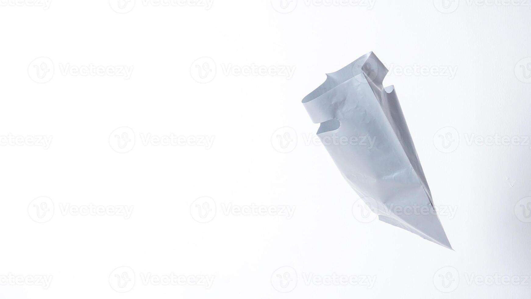 Side View of Open Gray Plastic Bag on White Background photo