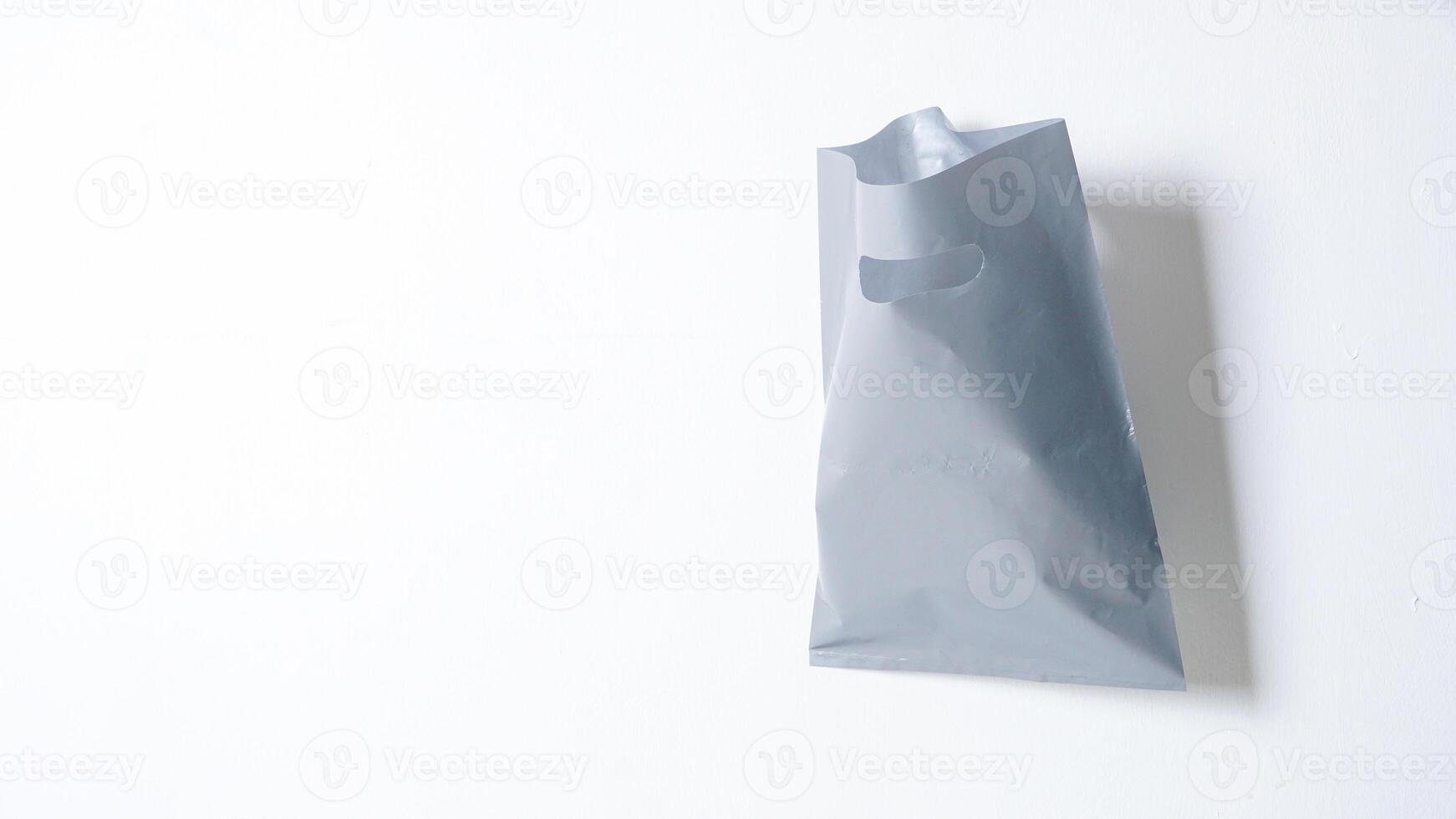 Open Blank Gray Plastic Bag Mock Up on White Background photo