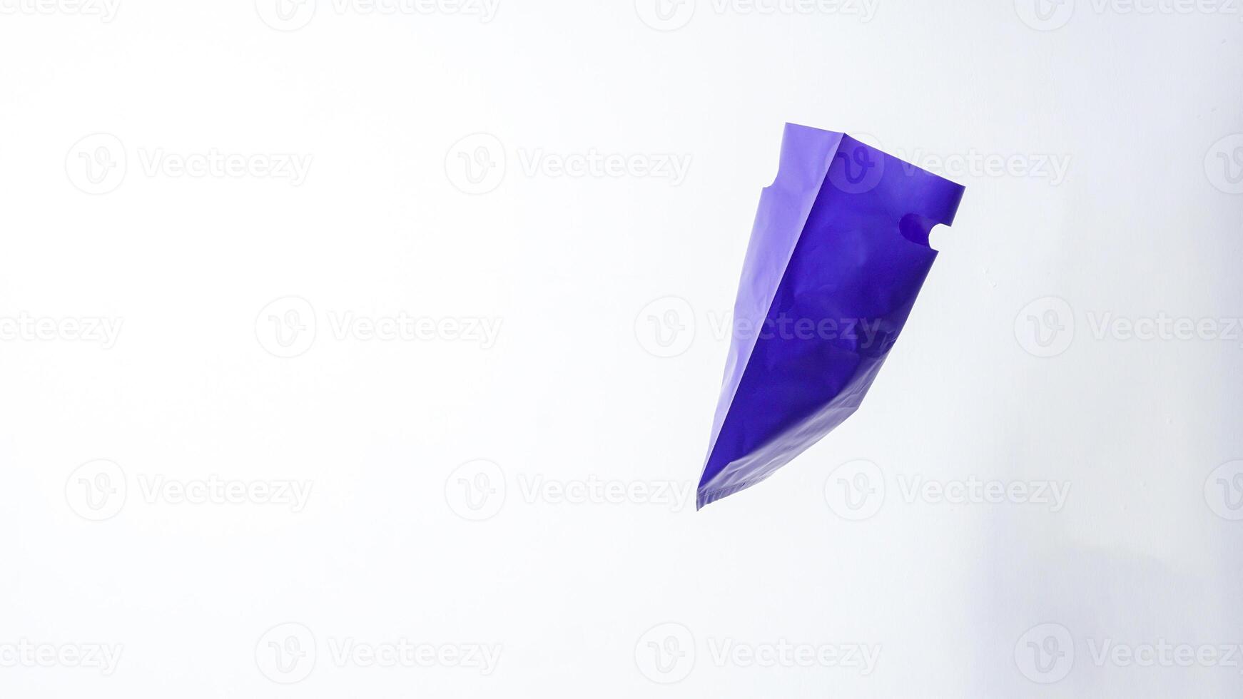 Side View of Open Purple Plastic Bag Mock Up with Handle on White Background photo