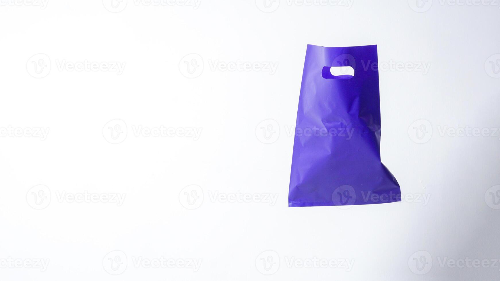 Open Purple Plastic Bag Mock Up with Handle on White Background photo