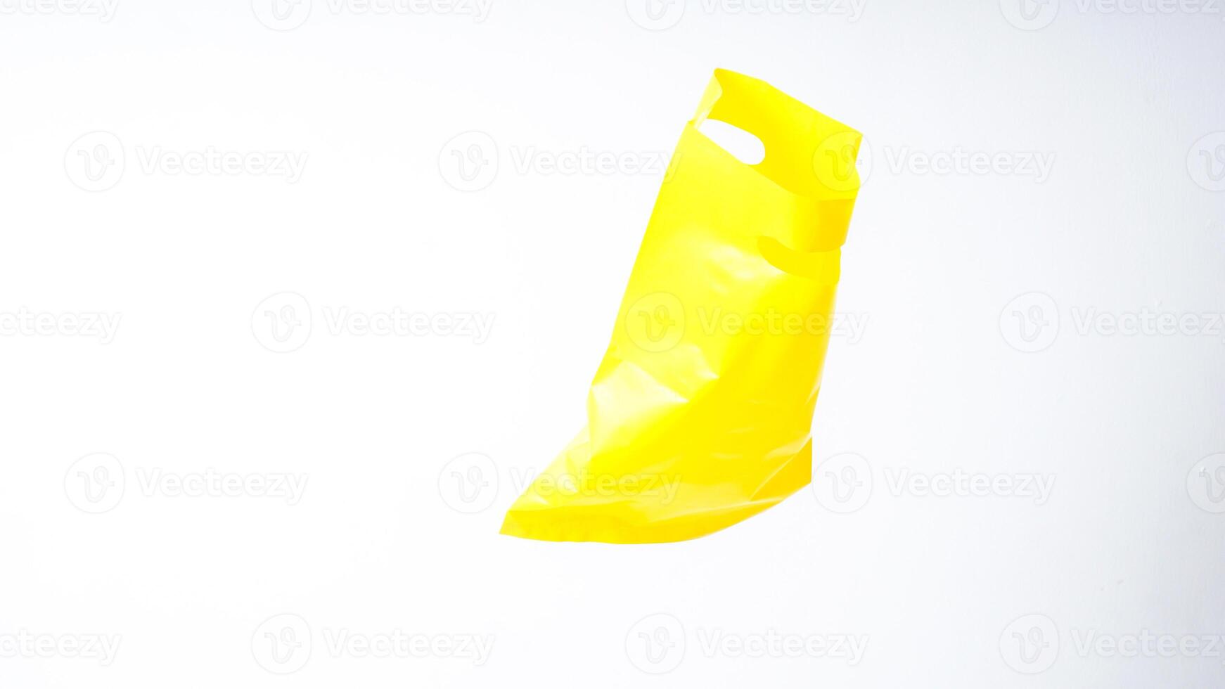 Open Yellow Plastic Bag Mock Up with Copy Space on White Background photo