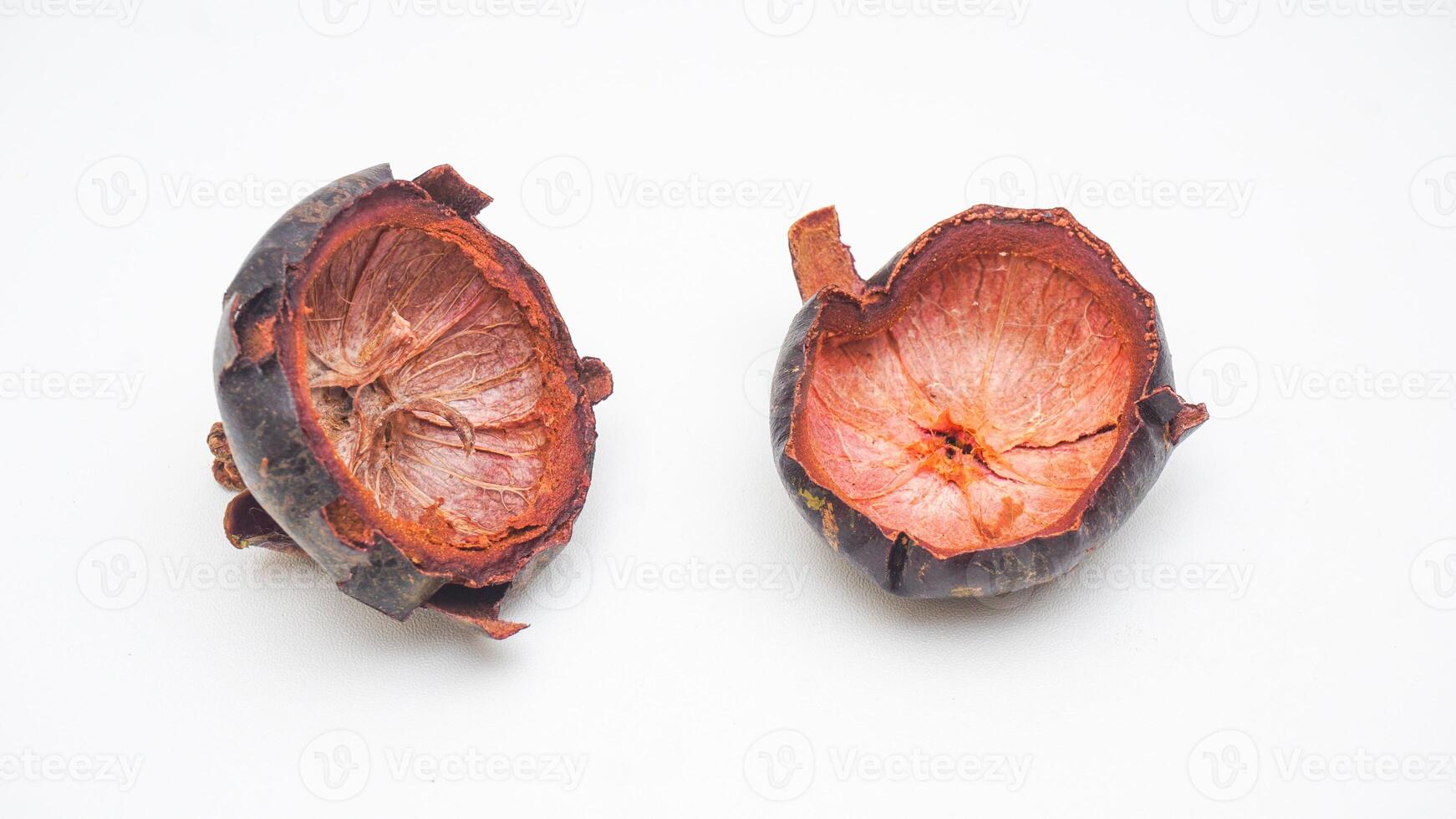 Two Mangosteen Peel on White Background photo