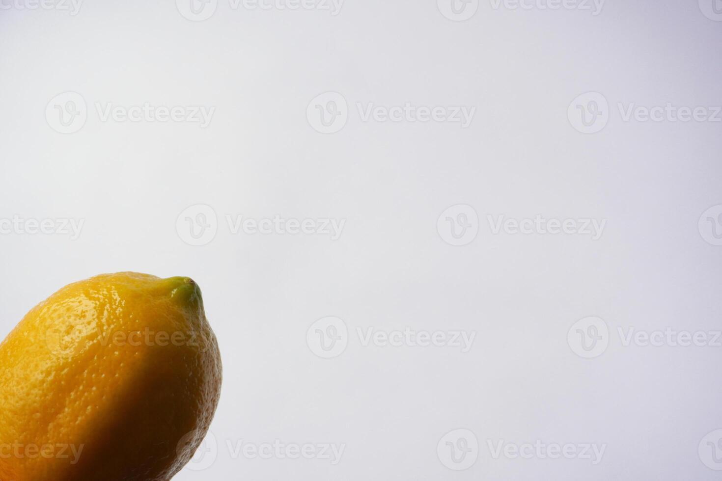 Lemon on White Background with Negative Space photo