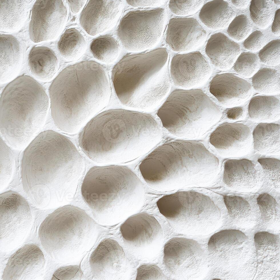 A close up of a wall made of white clay photo