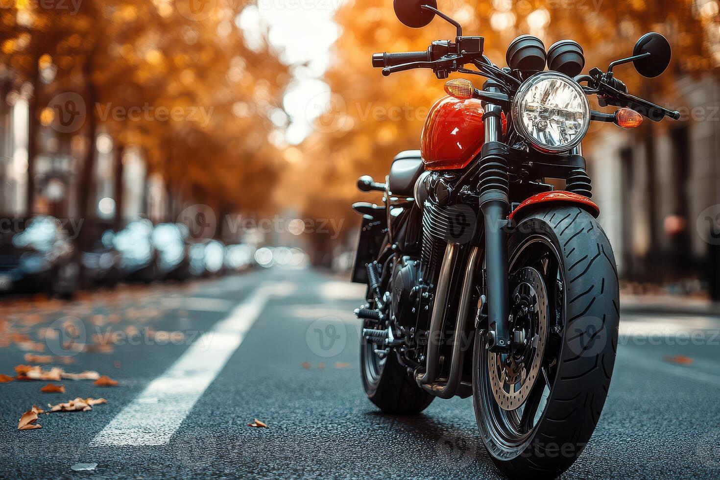 A red motorcycle parked on the side of a road photo