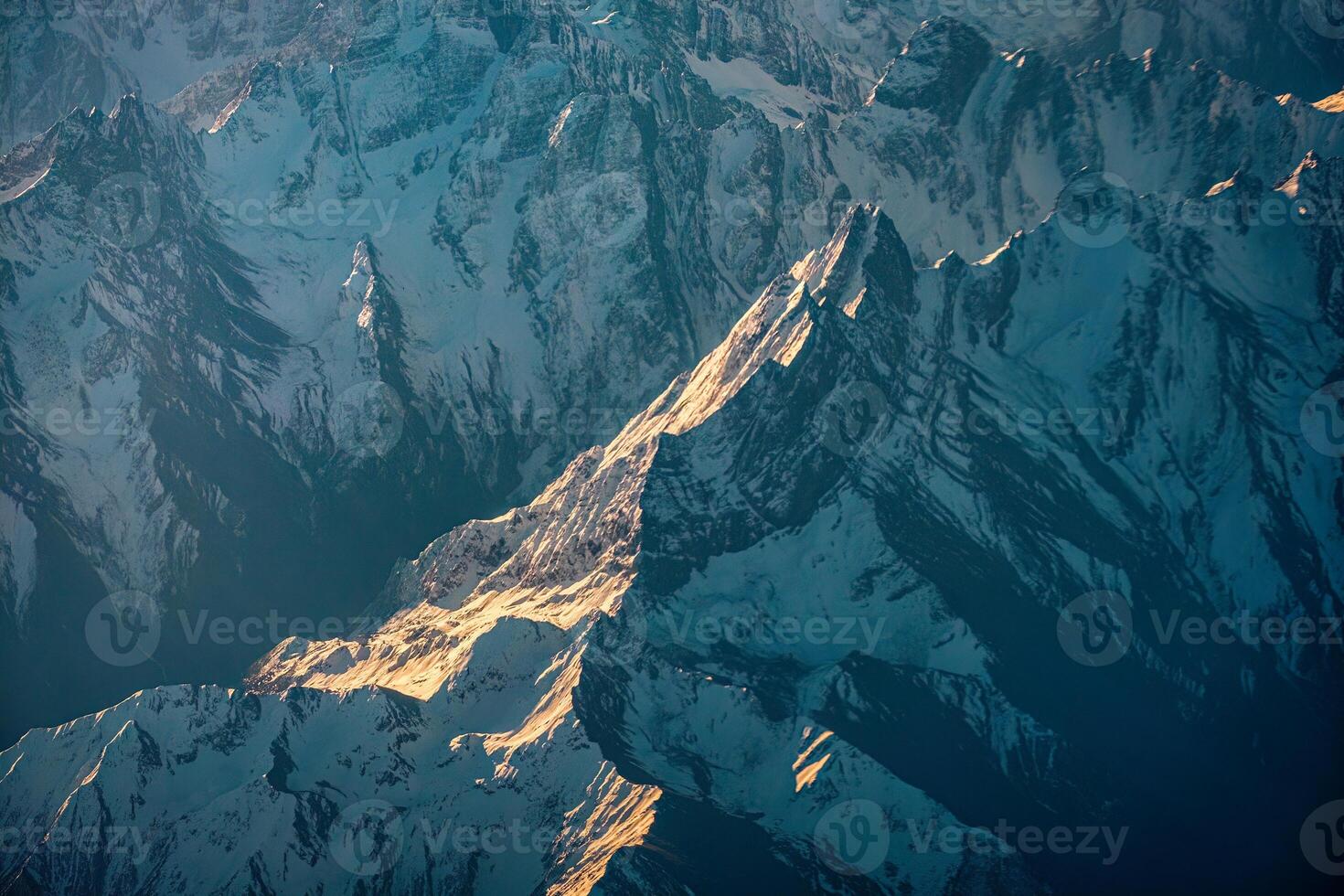 Snow capped Himalayan mountain peaks in China photo