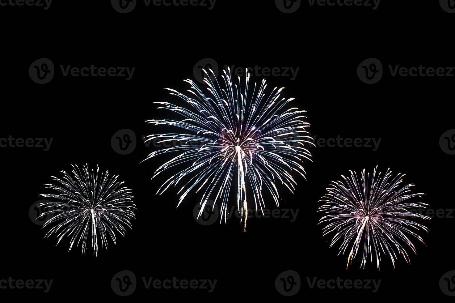 Celebration of colorful vibrant fireworks explosion photo