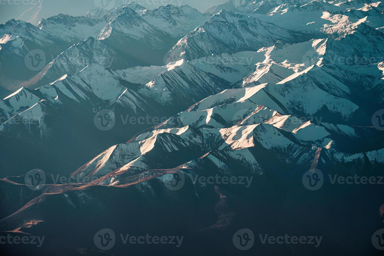 Snow capped on Himalayan mountain peaks in Tibet photo