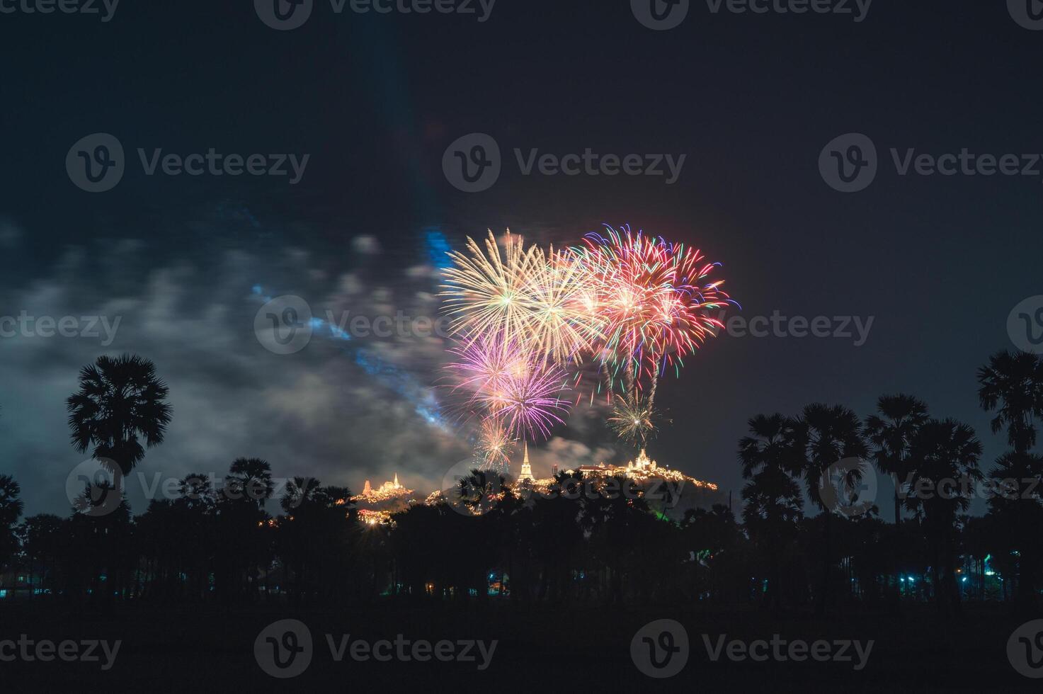 Annual festival of Khao Wang with colorful fireworks on hill at night photo