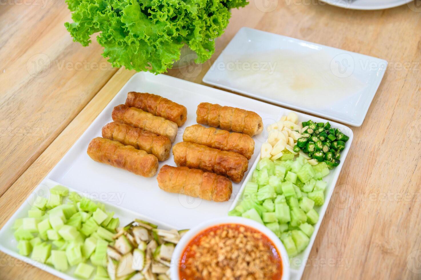 Nam Neaung of Vietnamese food with pork, vegetable and sauce photo