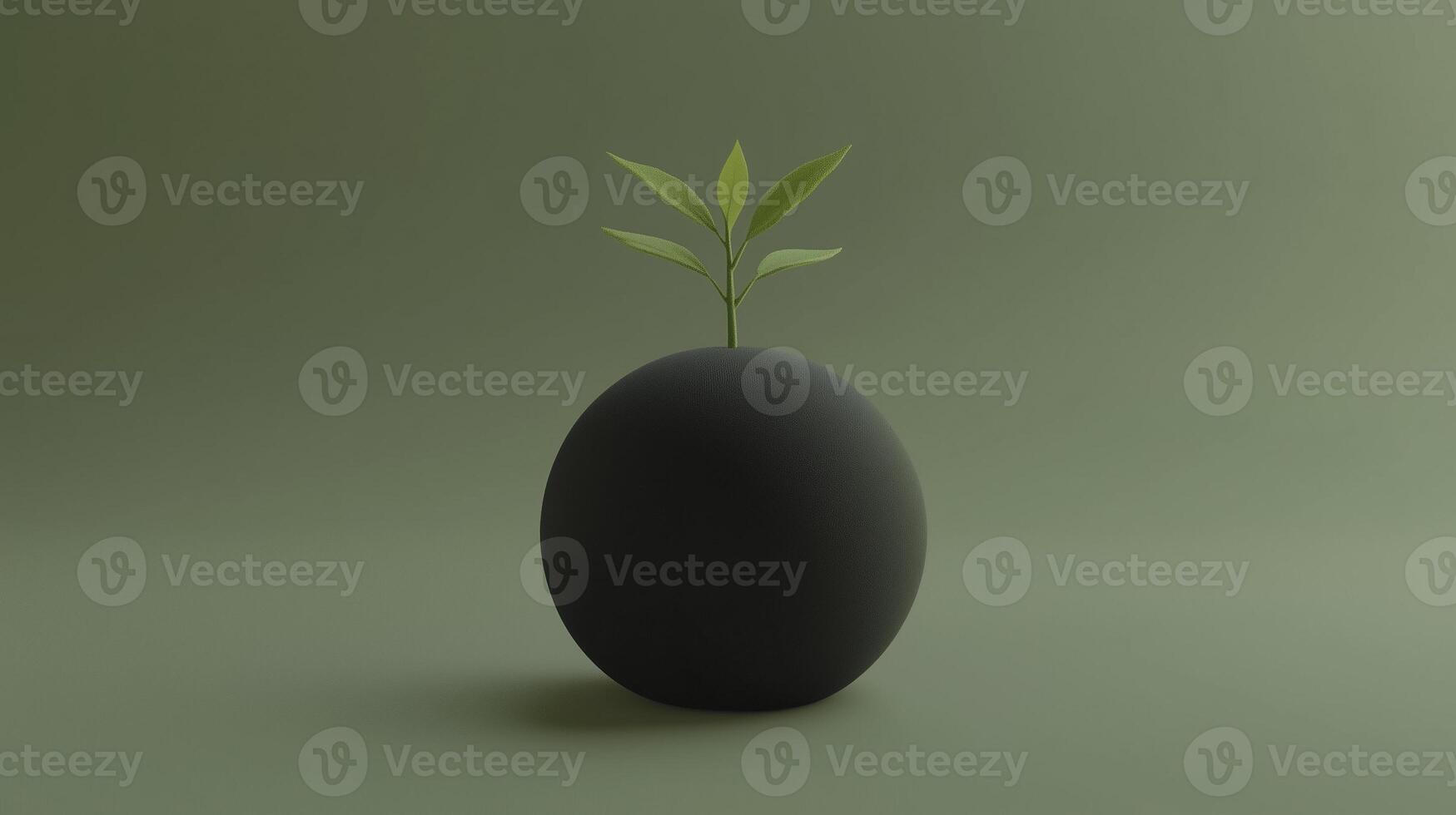 small green plant grows on top of dark sphere, symbolizing life and growth photo