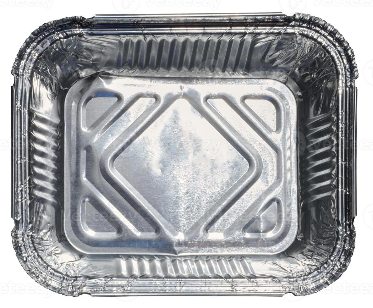 Empty foil baking dish on isolated background, top view photo