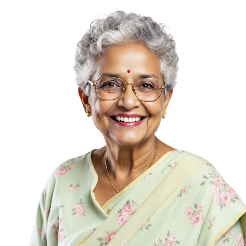 An older indian woman smiling and wearing glasses png