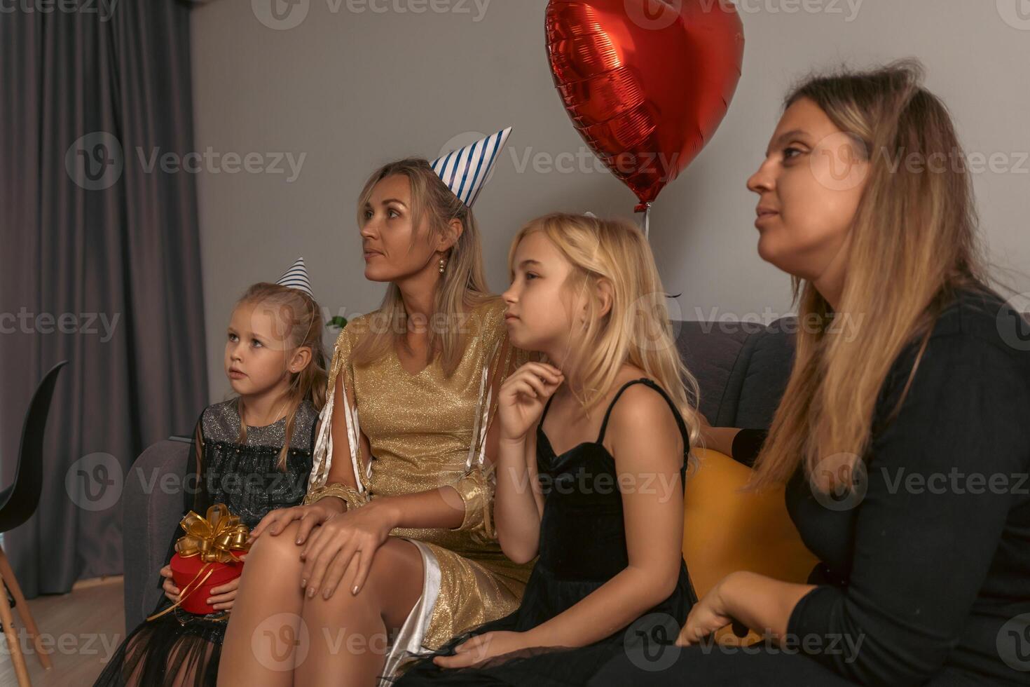 Birthday Party Family Home Movie Girls watching intently photo