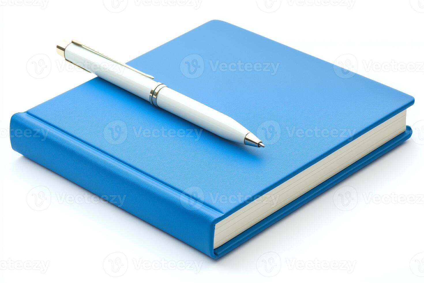 Blue notebook with pen on white background photo