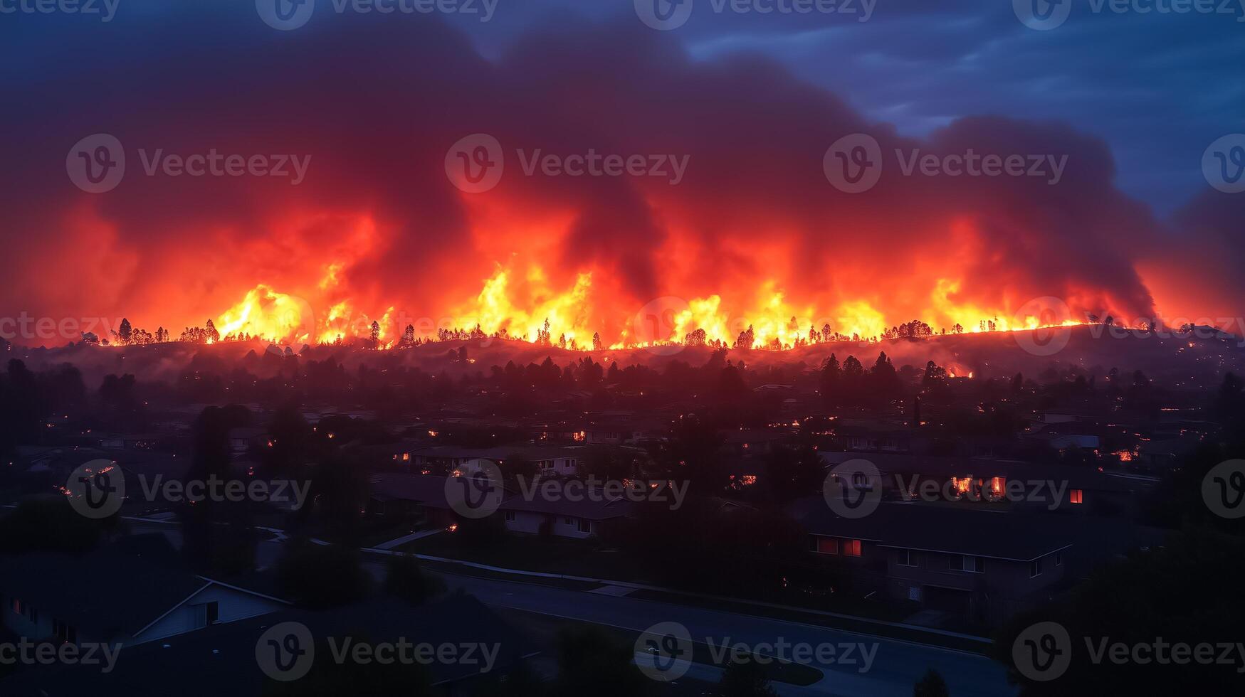 A large fire is burning in the sky over a residential area photo