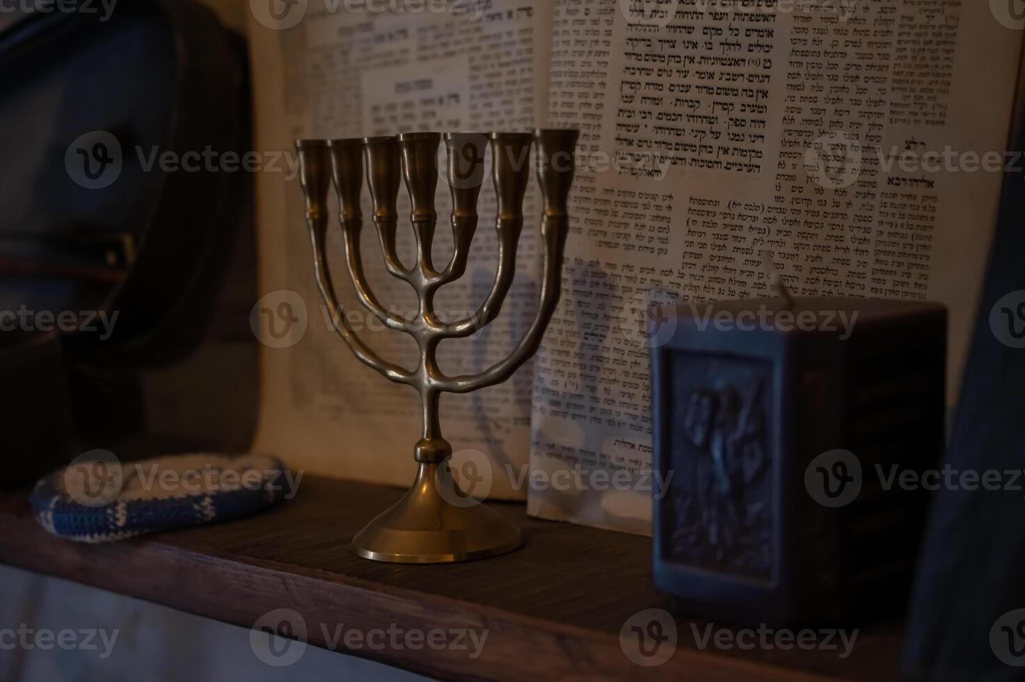 Jewish menorah on a shelf in a jewish home photo