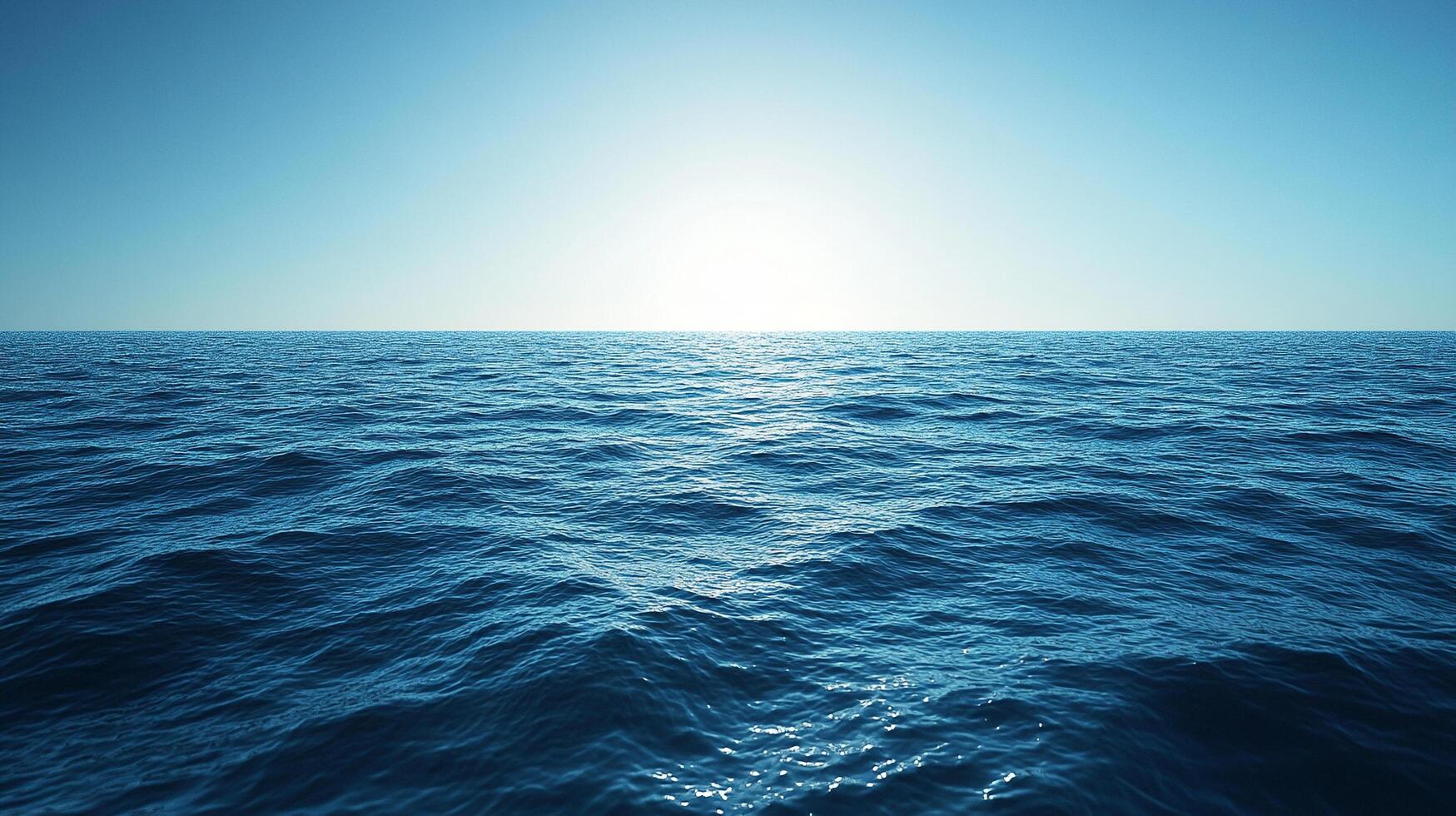A breathtaking view of the endless ocean, where the horizon seamlessly merges with the clear, bright sky under the warm sunlight. photo