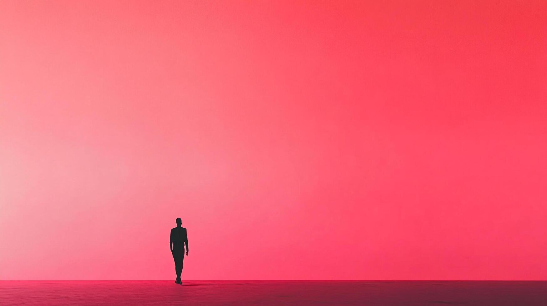 An enigmatic silhouette of a person walking slowly towards a bright red gradient background, evoking feelings of introspection and exploration of the self. photo