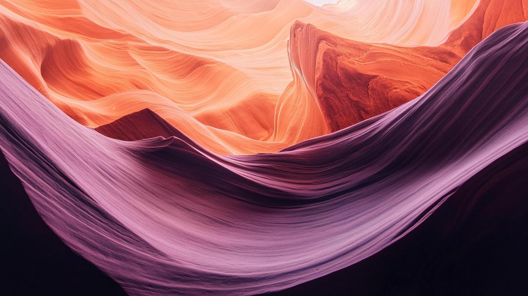 Sculpted sandstone walls create a vibrant, abstract canyon landscape with rich textures and contrasting shades in a natural rock formation. photo