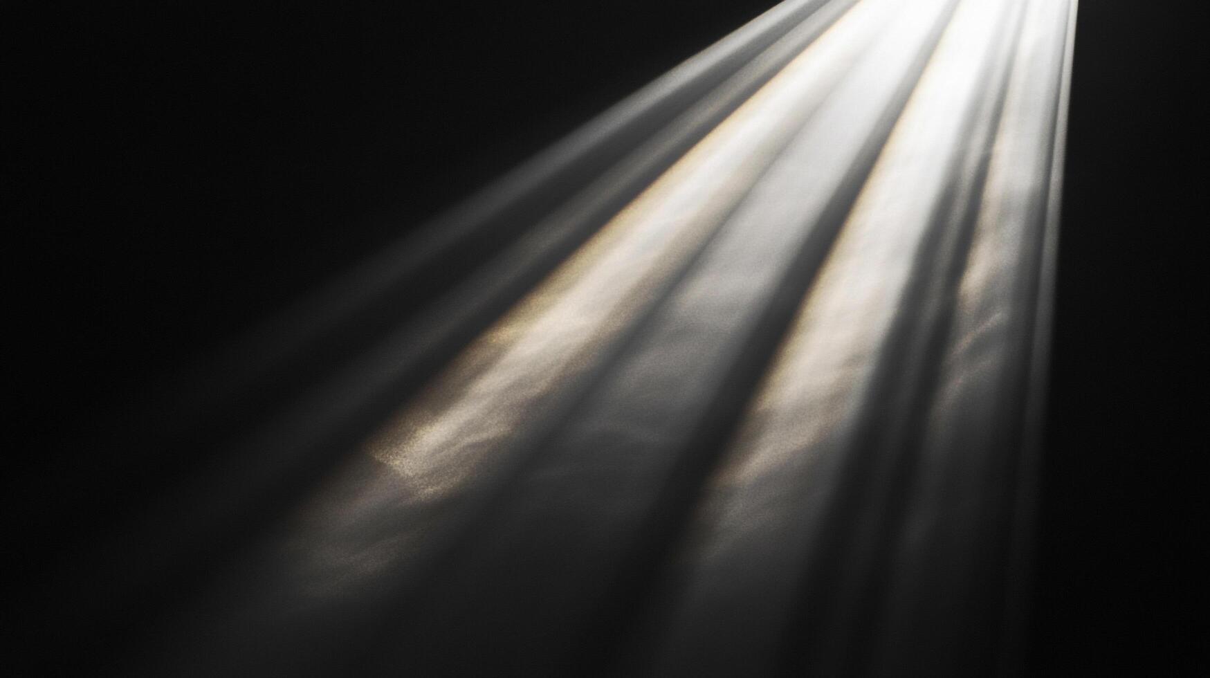 Beam of natural light streaming through the dark. A single, powerful ray of light, emphasizing beauty and hope against a dark background. photo