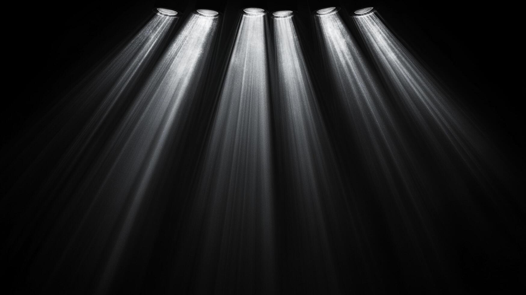 Rays of light pierce through a deep, dark space, creating an ethereal illumination that highlights the void with beams of shining clarity. photo