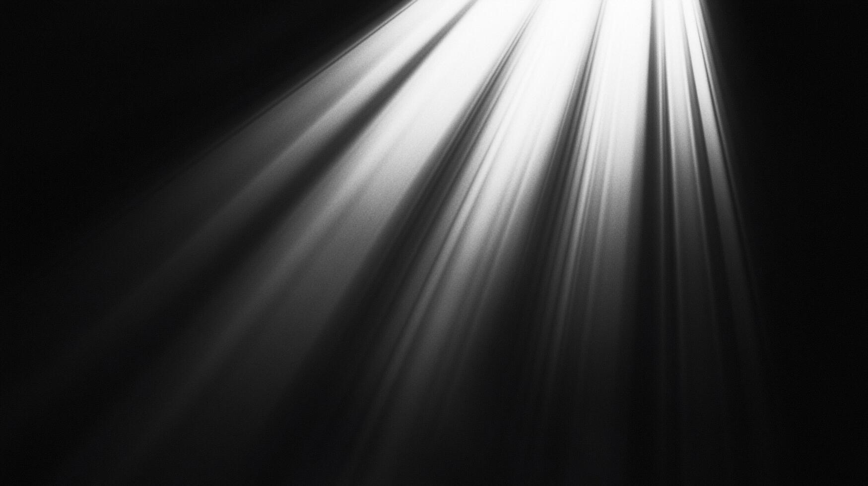 Rays of light cut through the darkness in a striking display, creating a dramatic and ethereal visual effect. Powerful illumination. photo