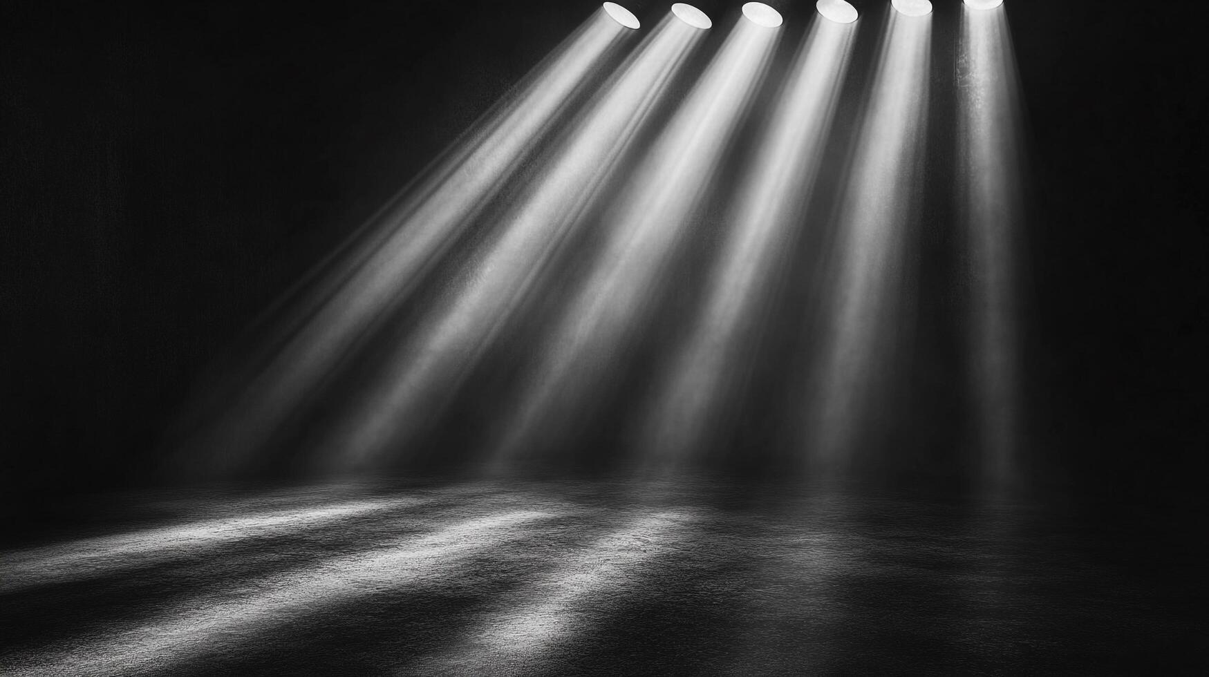 Illuminating rays of light create a striking contrast against a dark backdrop, enhancing the texture of the stage and creating a focal point. photo