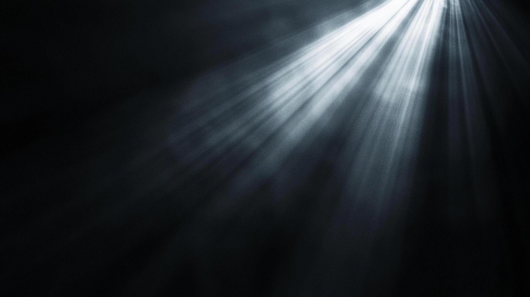 Dramatic light shafts break through the darkness, creating an ethereal and mysterious atmosphere in this captivating composition. photo