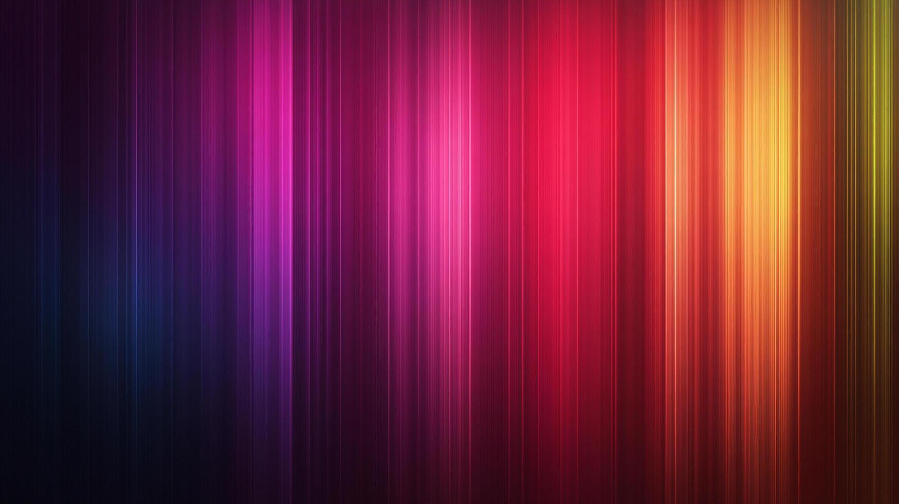 A vibrant spectrum of colors cascades down in vertical stripes, creating a dynamic and visually captivating abstract background. photo