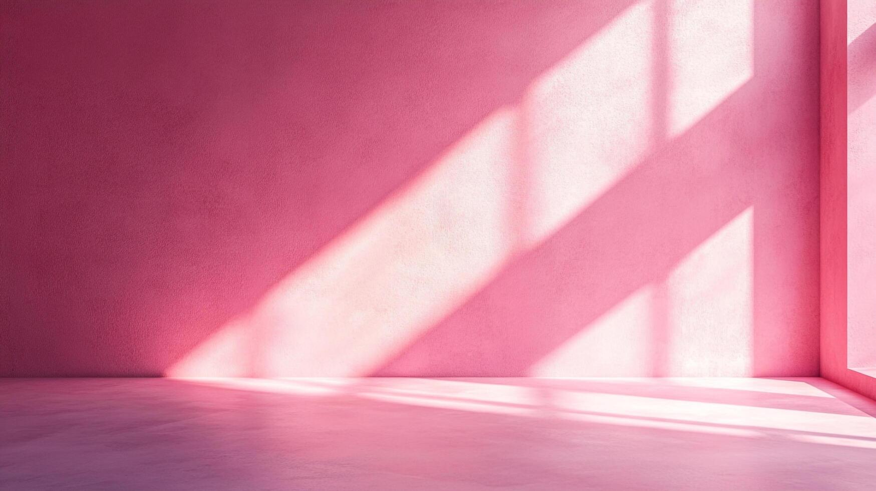 A minimalist pink room is illuminated by beams of natural light streaming through a window, creating an inviting, warm atmosphere. photo