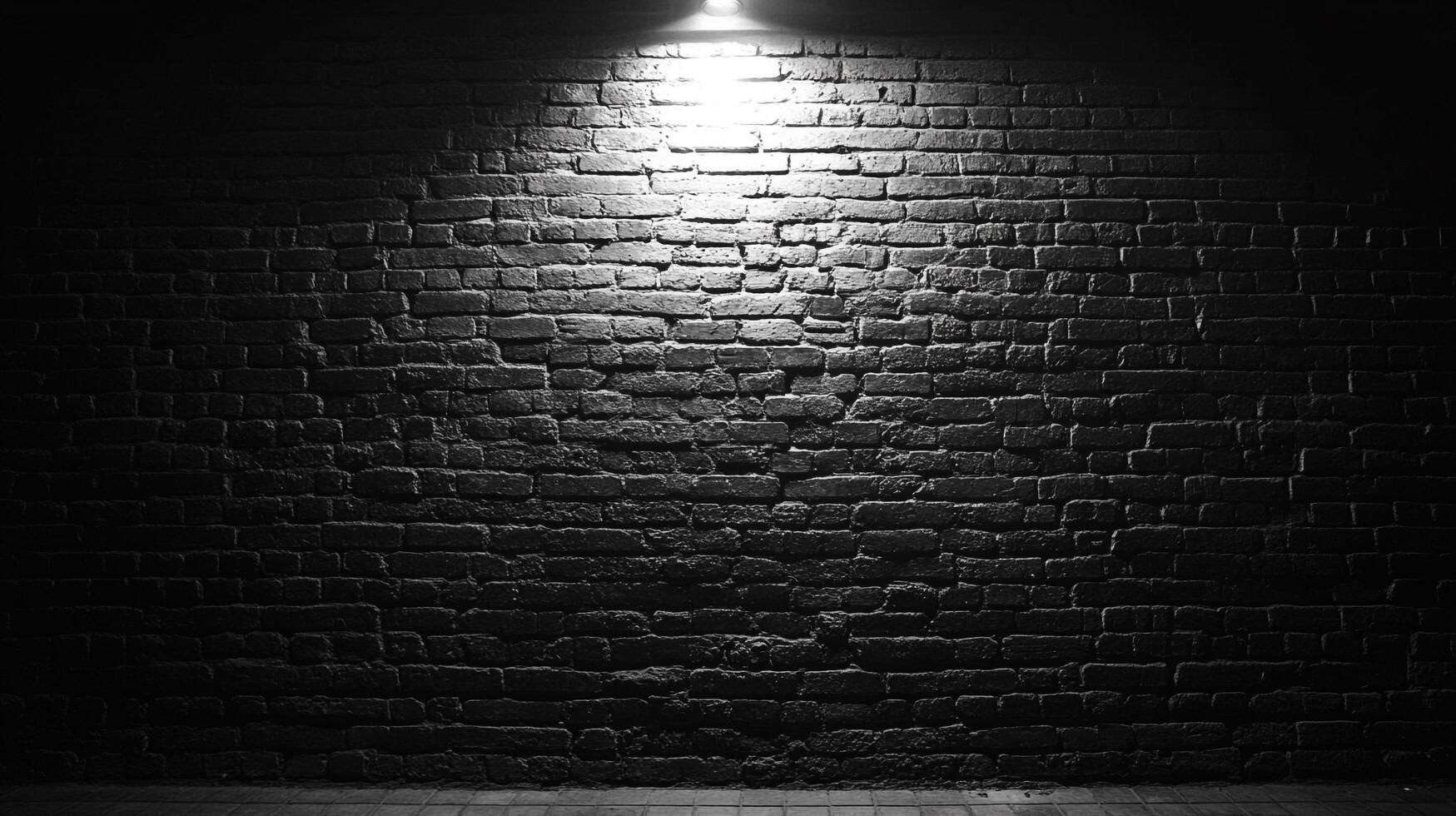 Monochrome brick wall illuminated by a single light, creating stark contrasts and dramatic shadows, showcasing texture and depth. photo