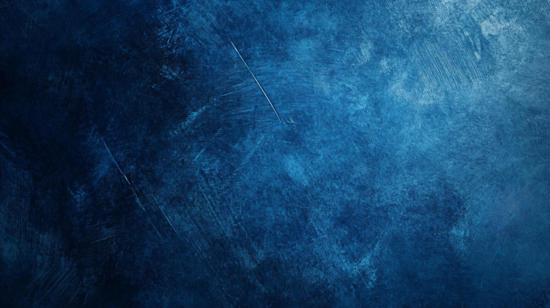 Dark blue textured background with brush strokes and grunge effects, perfect for adding depth and drama to any project photo