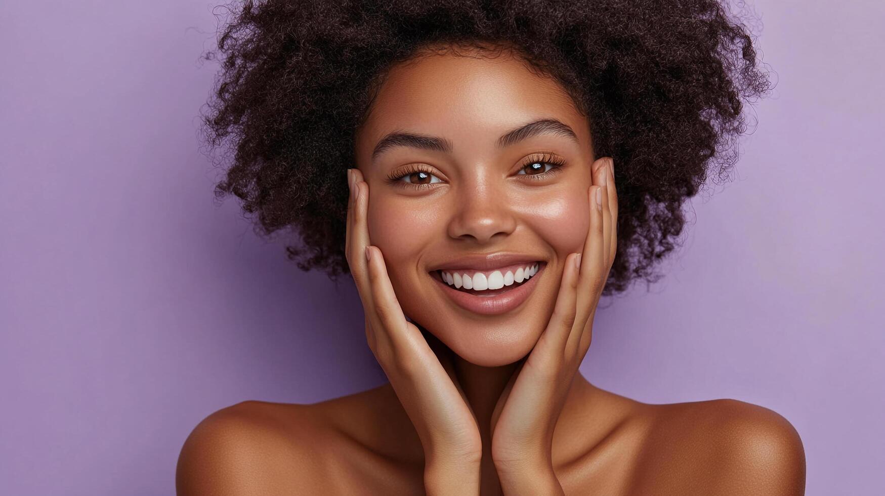 Radiant woman smiles, her hands gently framing her face, showcasing healthy skin and a cheerful expression against a solid backdrop. photo
