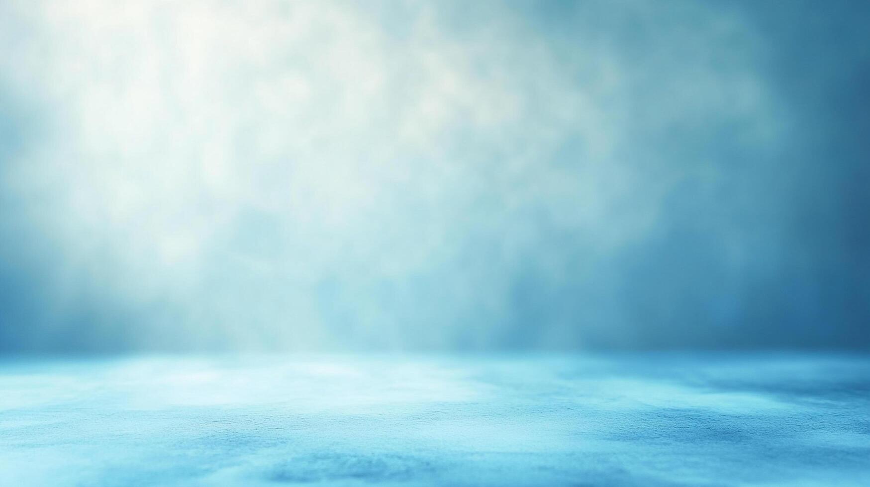 Serene studio backdrop featuring a soft blue gradient and textured surface, ideal for showcasing products or creating an atmosphere of tranquility. photo