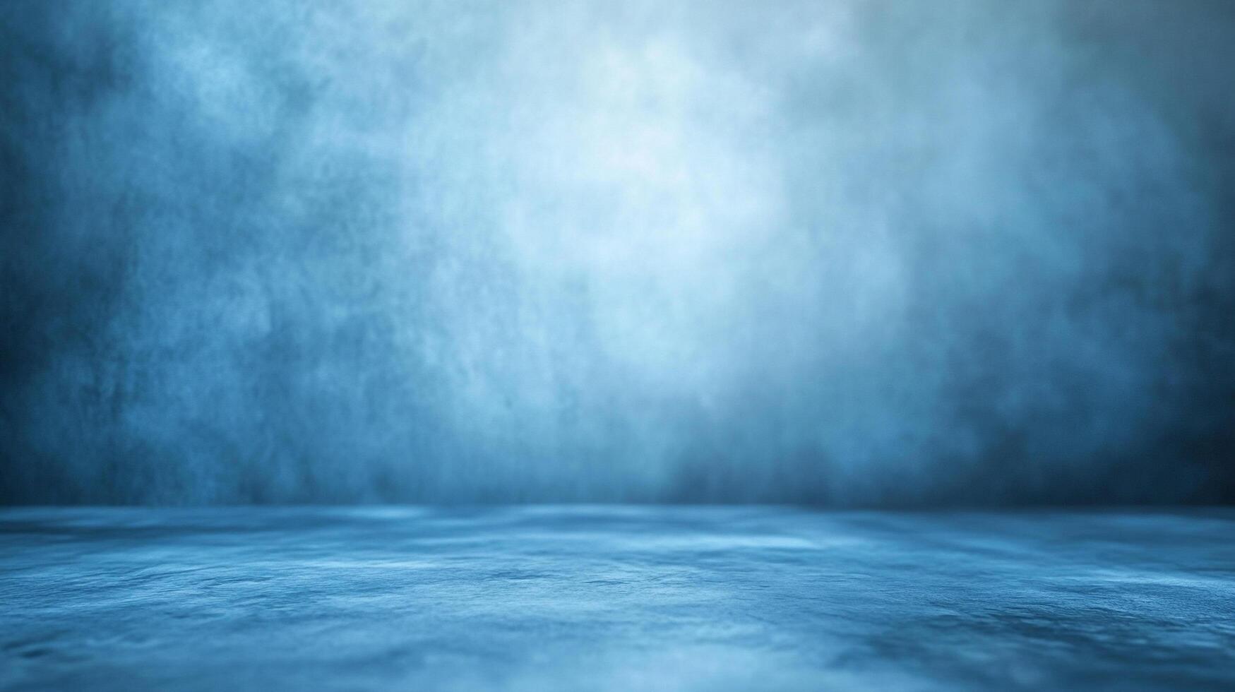 Minimalist blue studio background with texture and diffused light creates a serene and cool atmosphere ideal for product presentation. photo