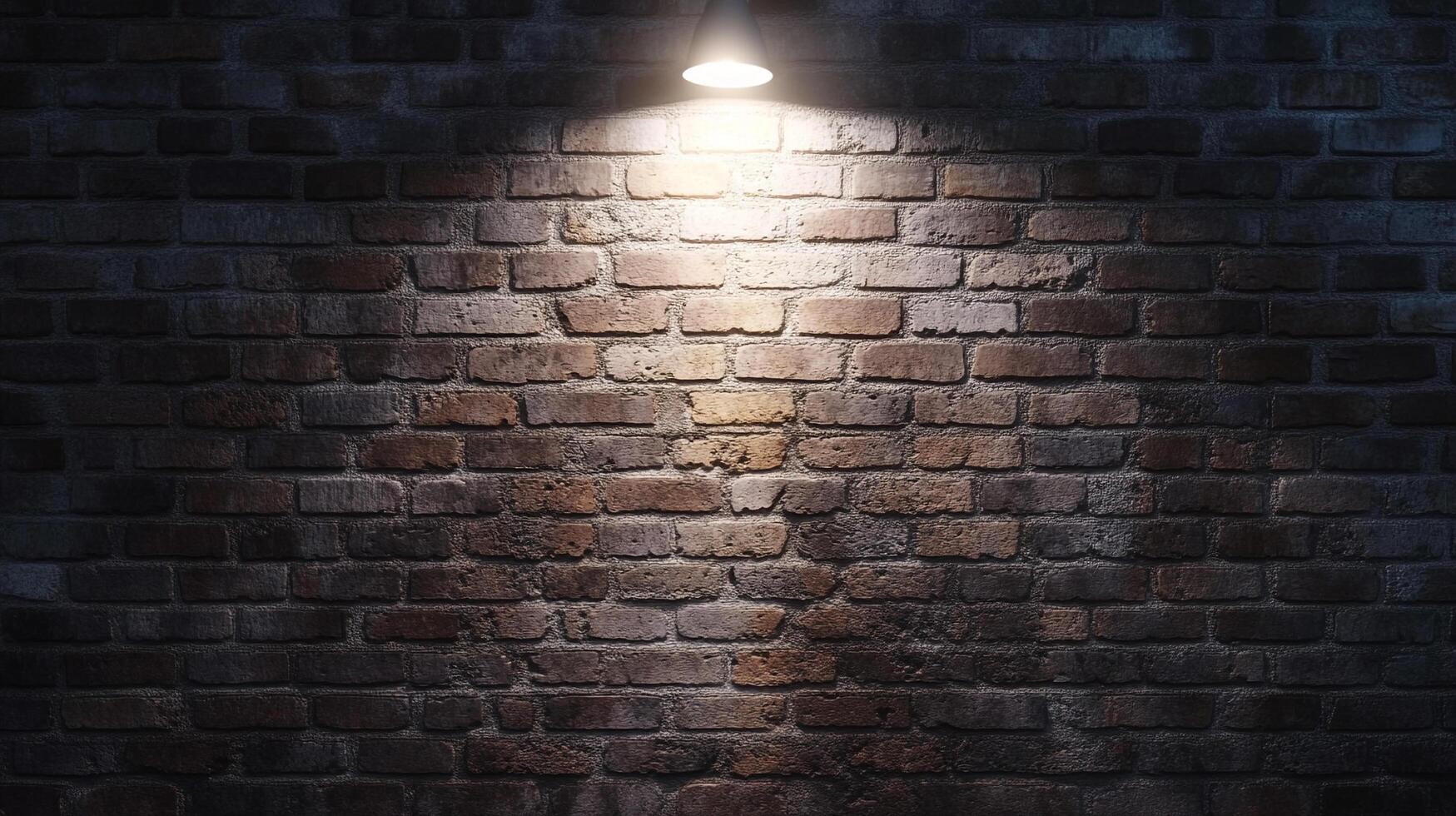 A textured brick wall under direct illumination, creating shadows and highlighting the rough surfaces of the aged material. photo