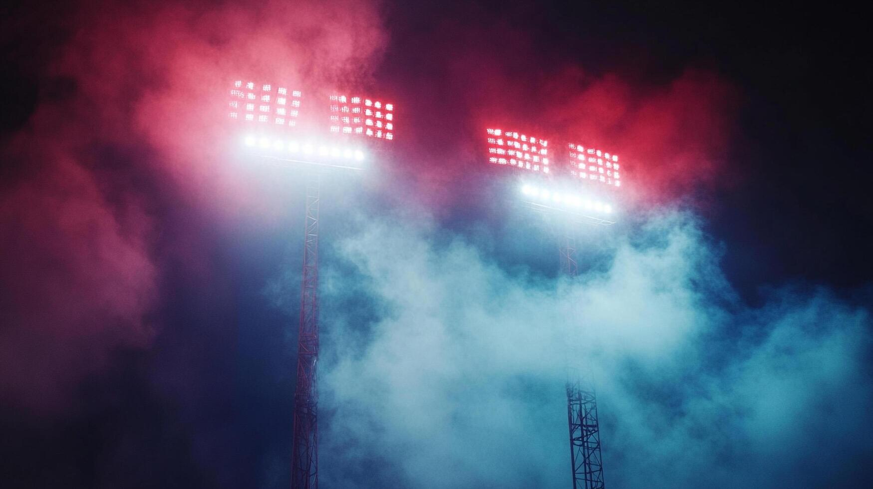 Illuminated stadium lights pierce through a haze of blue and red smoke, creating a captivating and atmospheric spectacle. photo