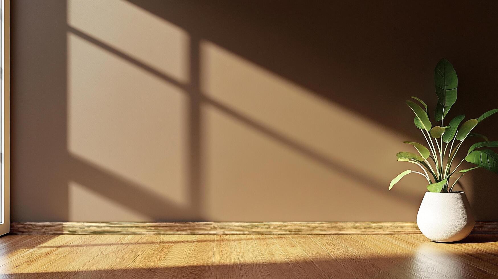 A minimalist interior features a potted plant bathed in sunlight against a warm beige wall with a window shadow for a serene ambiance. photo