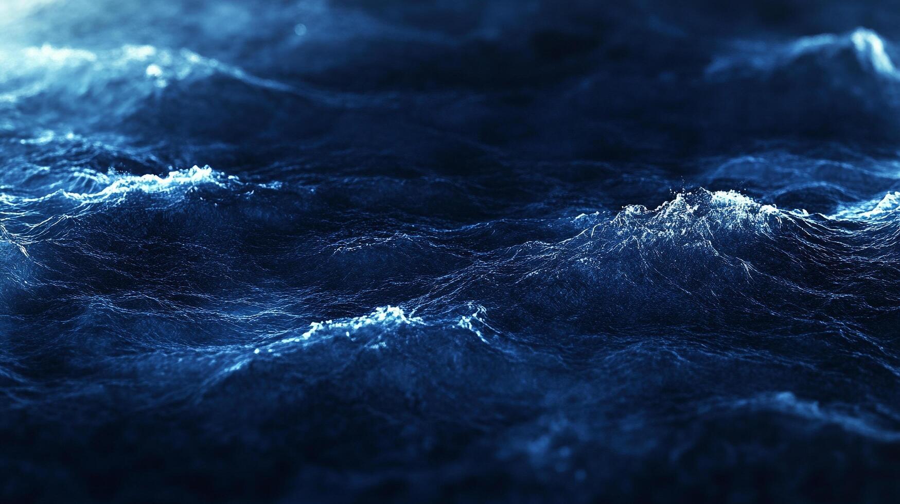 Deep blue sea ripples and crests. Water surface shimmering with light, reflecting the mood and feeling of the wide ocean. photo