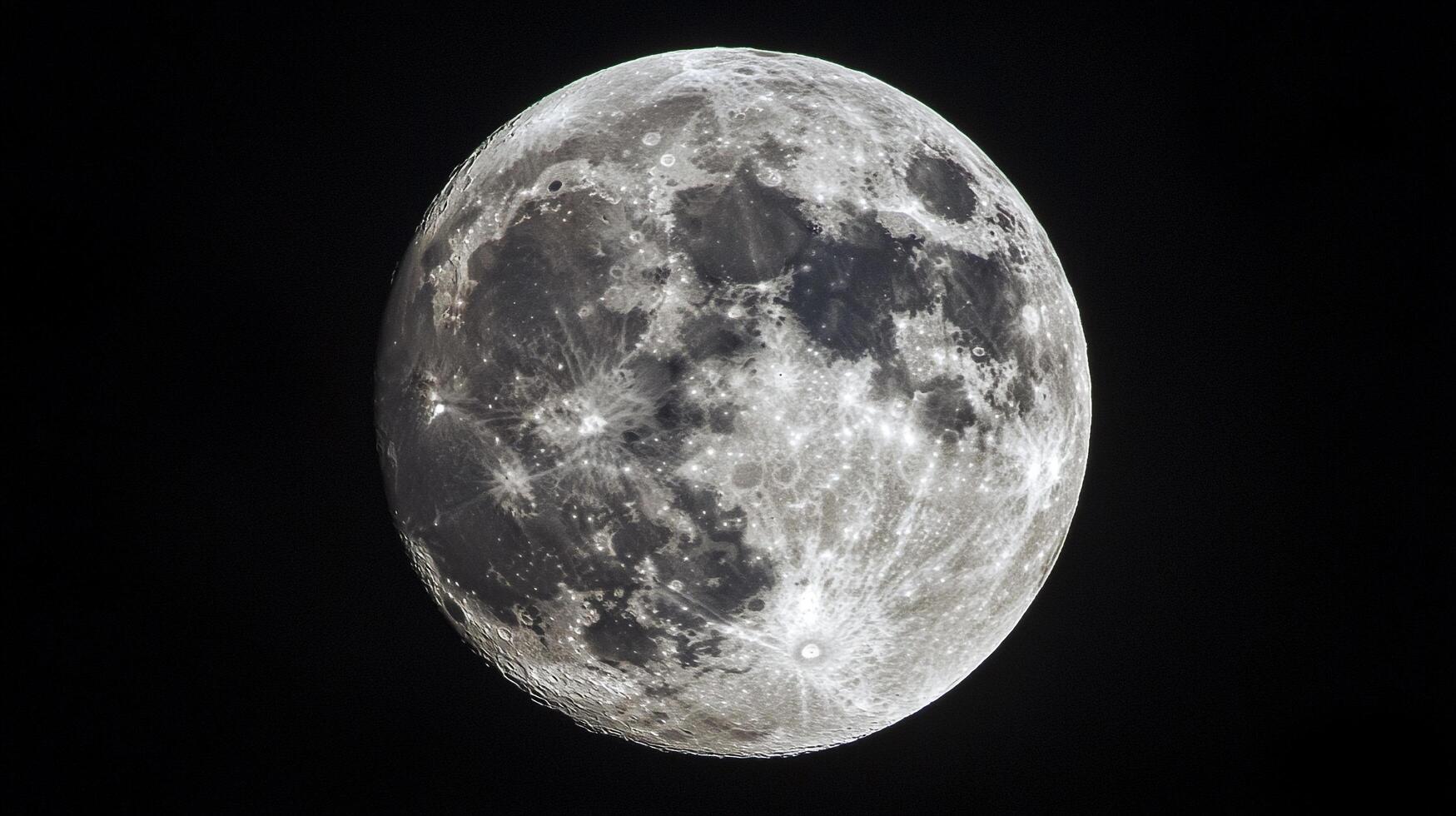 Detailed moon surface on a dark background shows craters, textures, shadows, and its ethereal glow. Lunar wonder against the night sky. photo
