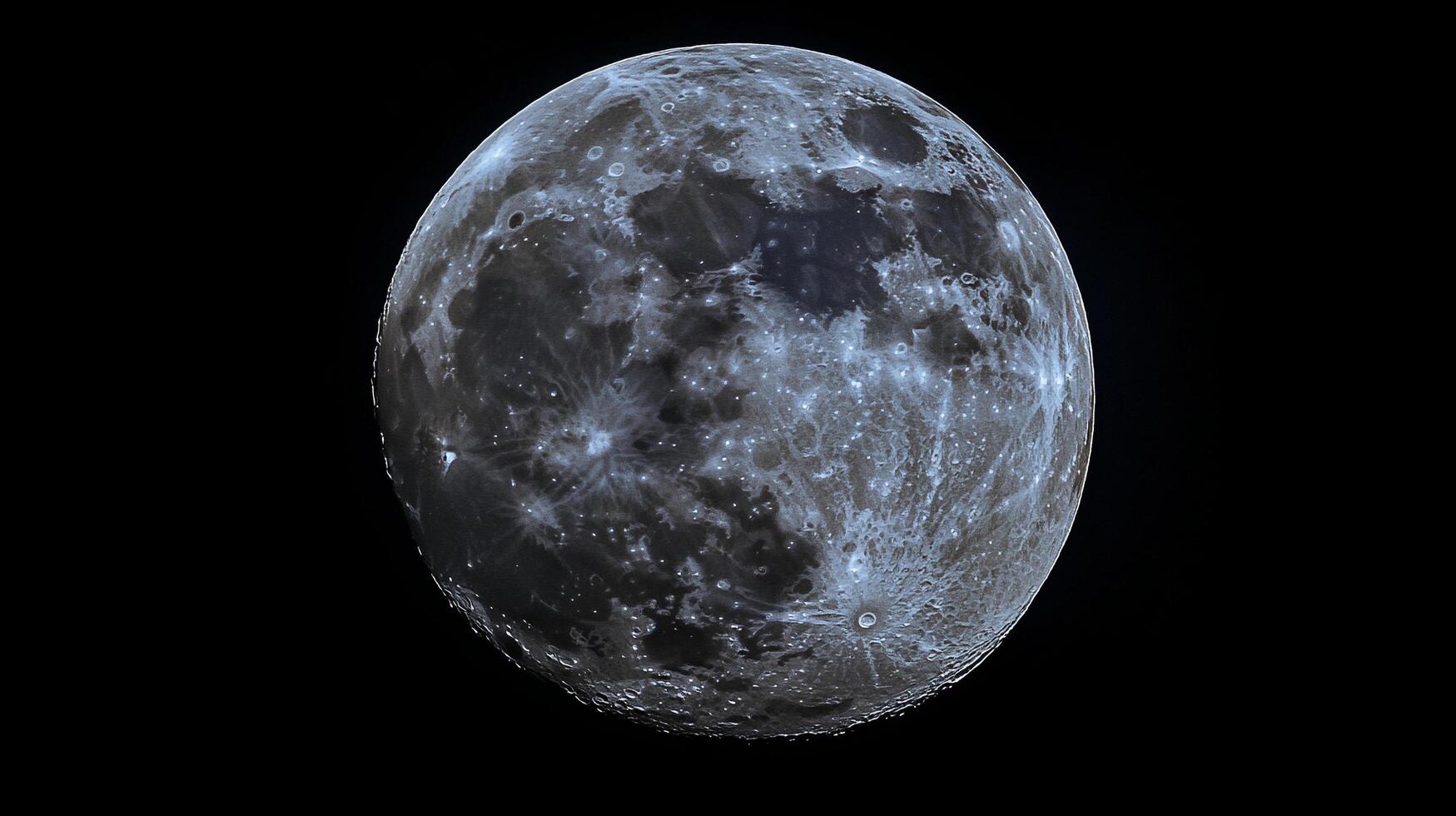 Detailed view of the moon. Gray tones show craters and shadows across lunar surface, isolated against stark black backdrop in space. photo