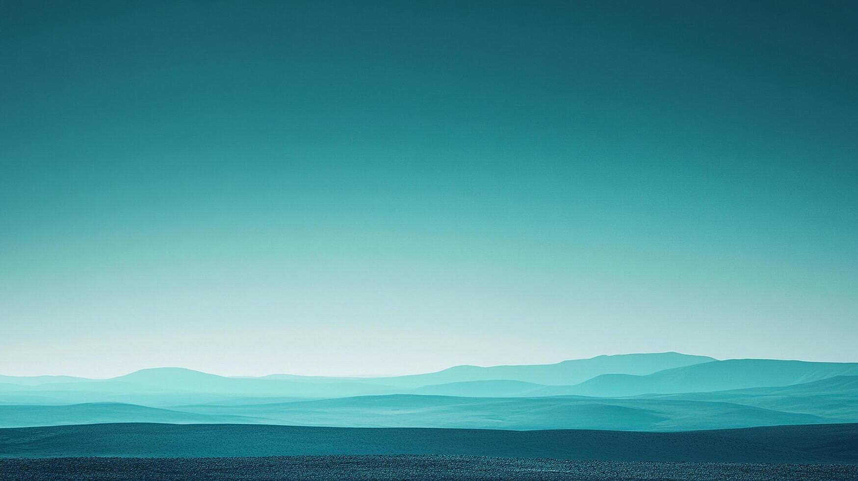 This image features a muted aqua landscape with distant rolling hills, evoking a sense of calm and serenity that connects the viewer to nature's vastness and beauty. photo